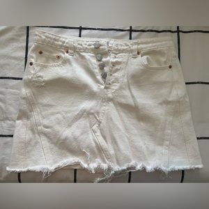 White jean skirt by Vestique.